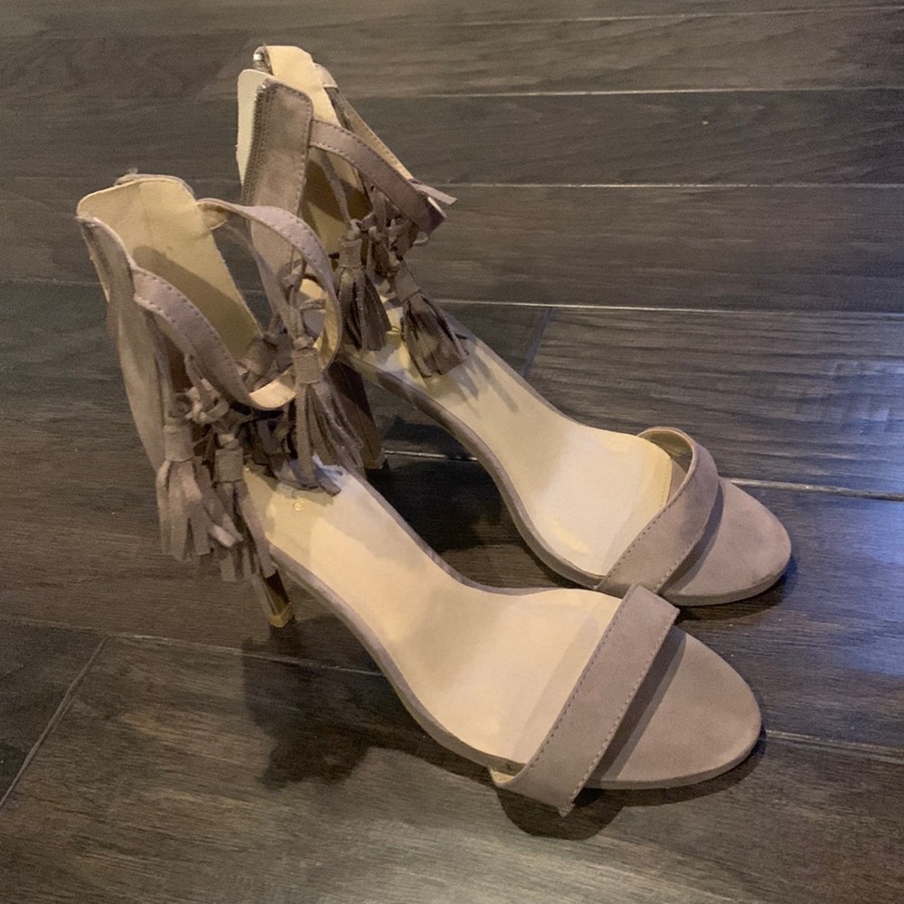 Super cute tan high heel open toed shoes. Barely worn.